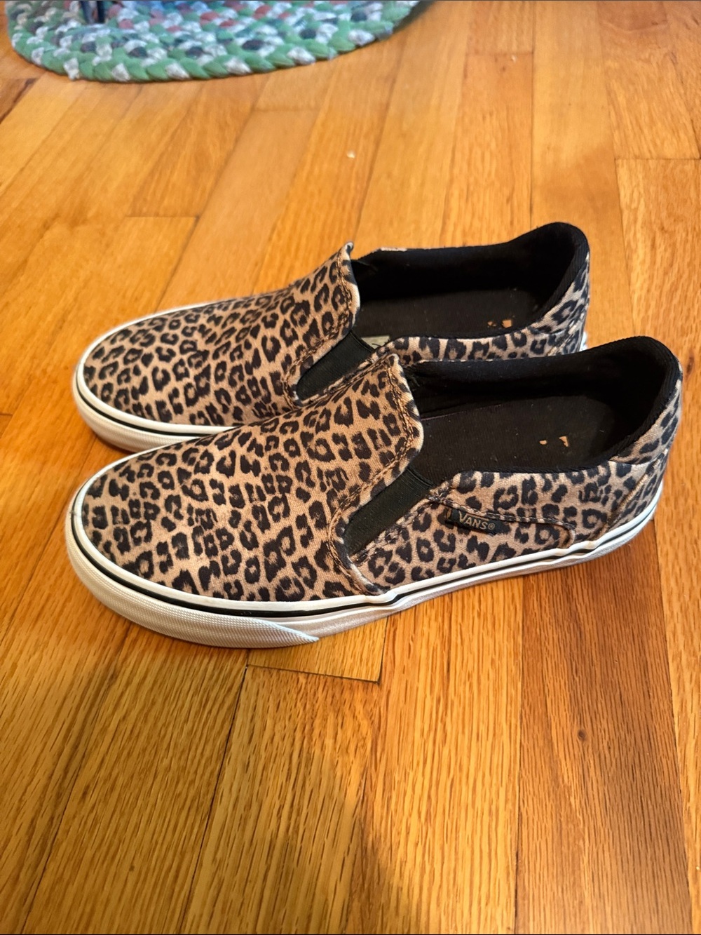 Vans Women’s Leopard Print Slip-On Sneakers in Tan and Black